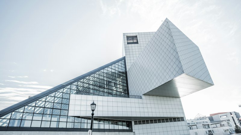 The Nations Branch Library from the street, its long glazed reading room rising to a folded metal-clad prow